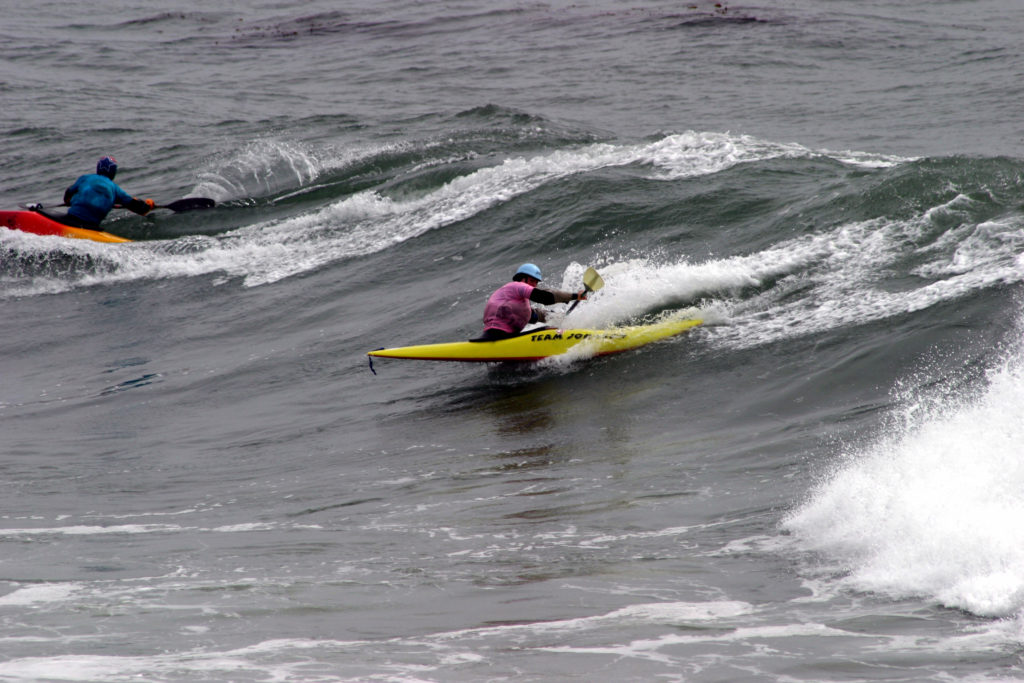 surf kayaking techniques - charging at a wave