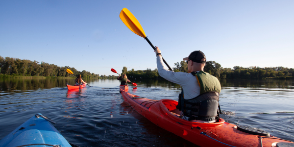 someone enjoying their sit-in-kayak