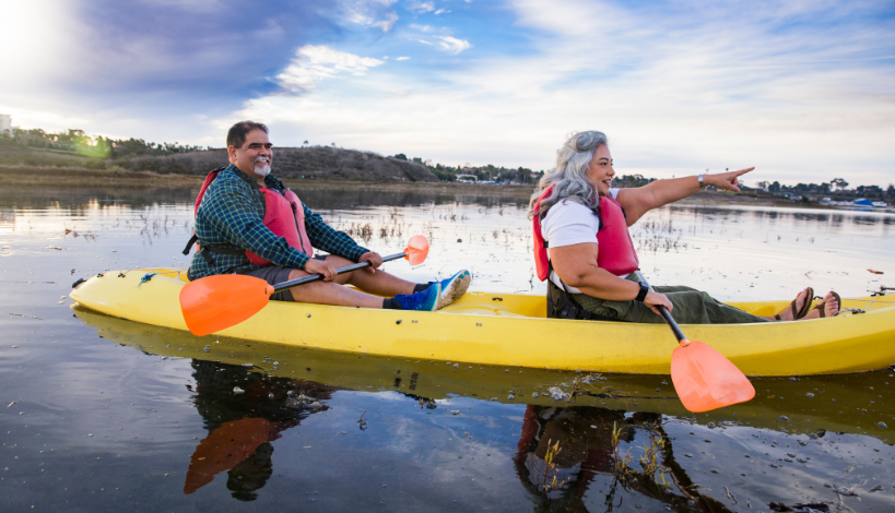 a bigger couple kayaking together comfortably