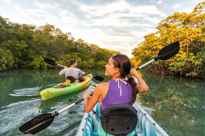 a woman enjoying her outing on a kayak