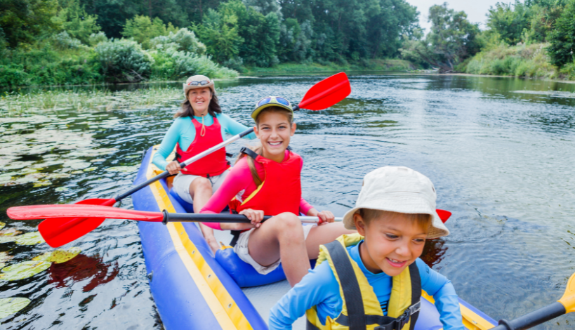 happy family kayaking stable