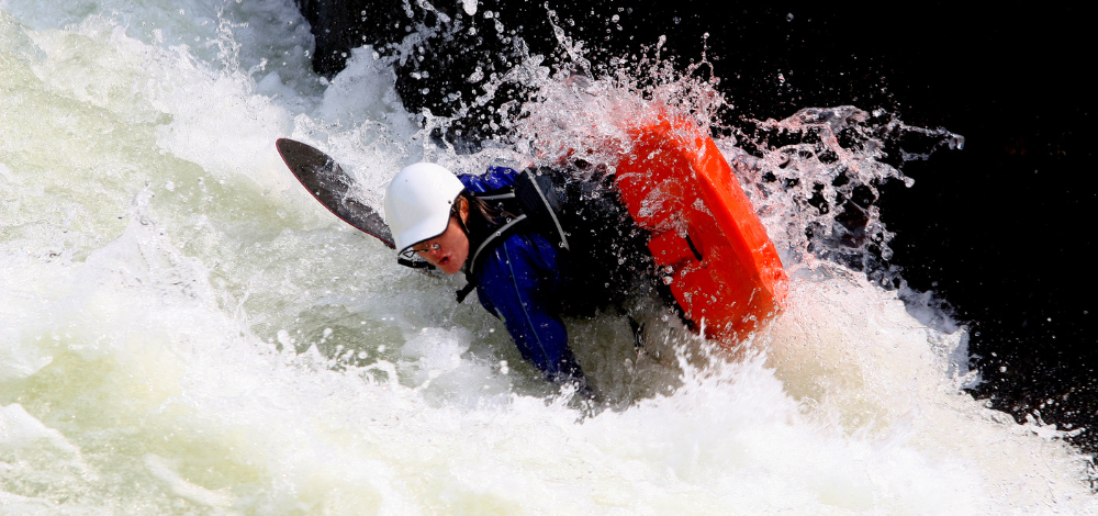 kayak flipping over